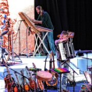They are definitely back at it – incorporating multiple instruments into each arrangement.  The band has clearly spent time honing transitions and turning this into a top notch show – Wow!   (photo by Danl Blackwood)