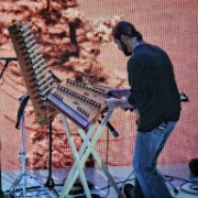 Michael on dulcimer, chime lyre, bells and soprano dulcimer for the new arrangement "O Come All Ye Faithful/Jesus Shall Reign."   (photo by Danl Blackwood)