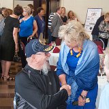 Speaking with Kerry Livgren is Jannett Wiens.