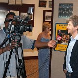 Dave Ragsdale is interviewed by WIBW cameraman Jovarie Downing
